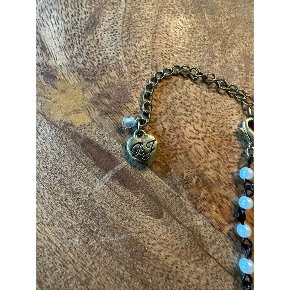 Betsey Johnson, oval zebra print beaded pendant